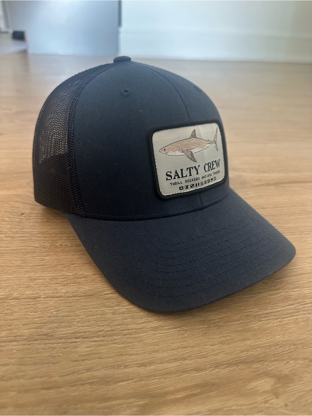 Salty Crew Navy Blue Mesh Trucker Hat with Shark Patch